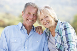 Bone Grafting And Dental Implant Patients Smiling Together