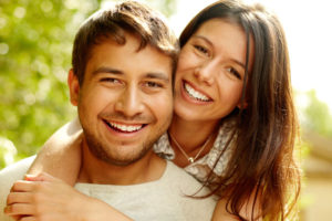 Dental Patients Smiling With Well Cared For Dental Implants In Oakdale, PA