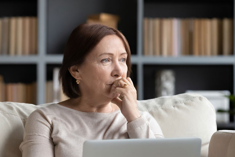 Dental Patient Wondering If She Should Get Dental Implants Or Dentures in Oakdale, PA