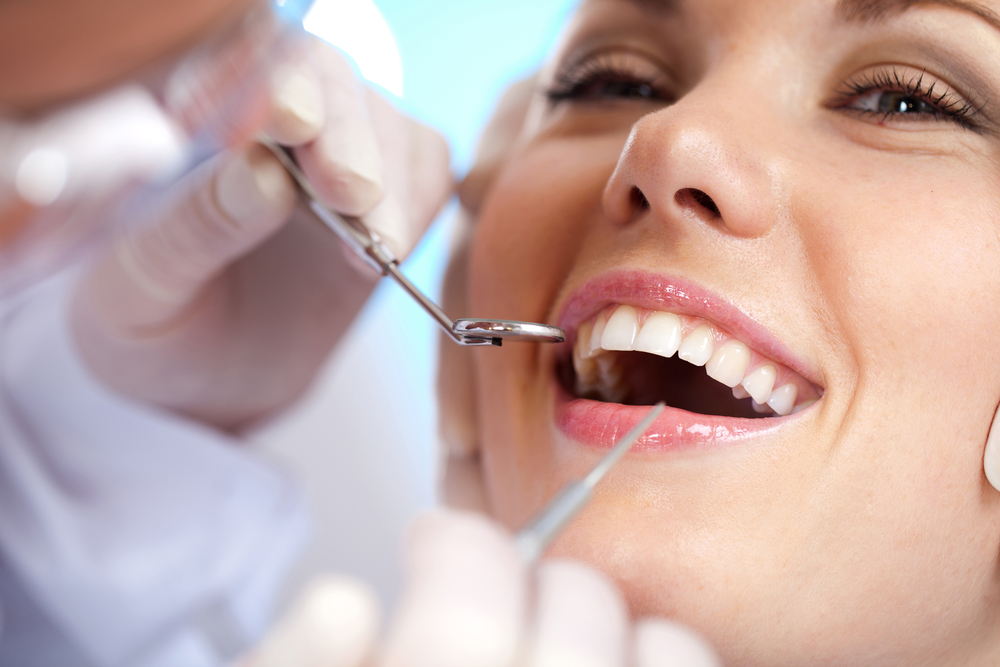 close up of a woman having dental exam