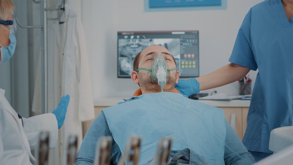 man at dental visit is sedated